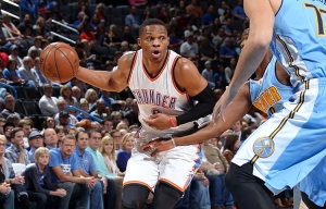 Russell Westbrook looks to dish out one of his 12 assists. Photo courtesy of Layne Murdoch of NBAE via Getty Images. 