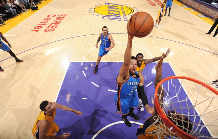 Thunder G Andre Roberson grabs a rebound. Photo courtesy of Andrew D. Bernstein of NBAE via Getty Images.